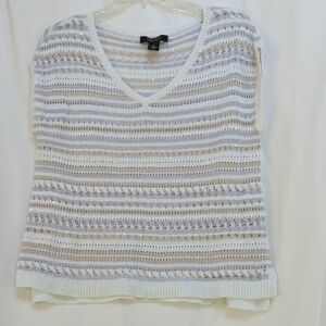 Women's white V-neck sweater vest with silver and gold stripes